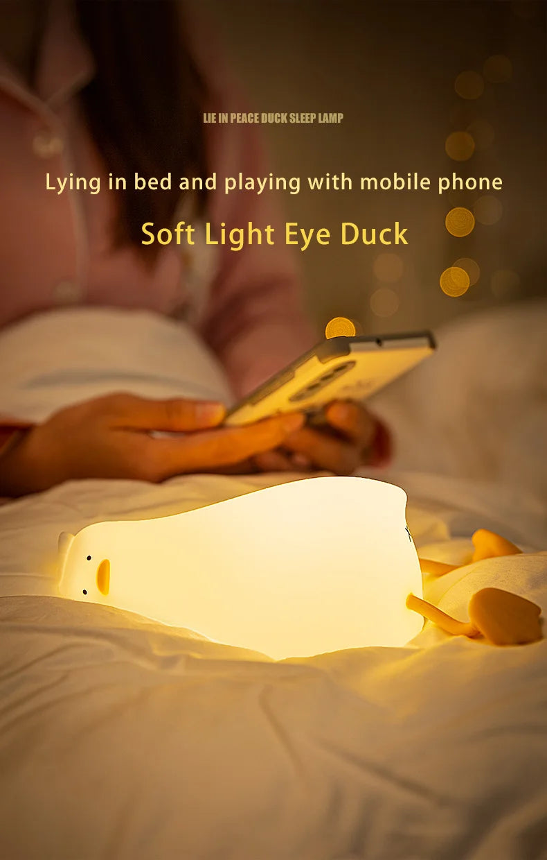 Veilleuse Canard Couché à Plat en Silicone, lampe tactile rechargeable à intensité variable.